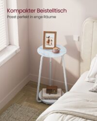 Runder Beistelltisch mit Marmor-Optik und schmalen Stahlbeinen, ideal für ein modernes, minimalistisches Zuhause.