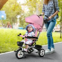Rosa 2-in-1 faltbares Dreirad mit Sonnendach, ideal für Kinder von 1-5 Jahren. Es ist kompakt verstaubar und perfekt für unterwegs.