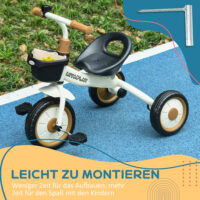 Weisses, verstellbares Dreirad für Kinder von 2-5 Jahren, mit praktischem Fahrradkorb. Ein vielseitiges Kinderfahrzeug für die ersten Fahrten.