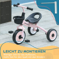 Rosa Dreirad als Kinderfahrzeug mit verstellbarem Sitz, Fahrradkorb und Klingel. Es wächst mit dem Kind mit und ist perfekt für Ausflüge.