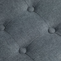 Ein grauer, quadratischer Fusshocker in Leinenoptik, Maße 35x35x35cm.