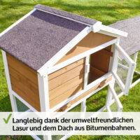 Stabiler Holzhasenstall mit Freigehege für gesunde Bewegung der Tiere.