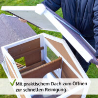 Stabiler Holzhasenstall mit Freigehege für gesunde Bewegung der Tiere.