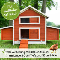 Großer roter Hühnerstall mit großzügigem Auslaufbereich.