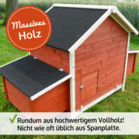 Großer roter Hühnerstall mit großzügigem Auslaufbereich.