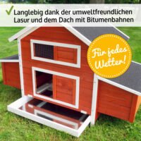 Großer roter Hühnerstall mit großzügigem Auslaufbereich.