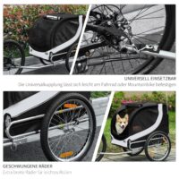 Weiss-schwarzer praktischer Hundeanhänger für das Fahrrad, 130x73x90cm, bietet eine sichere und komfortable Fahrt für Ihren Vierbeiner.