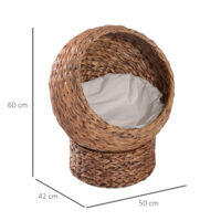 Hellbraune Katzenhöhle aus Rattan mit passendem Kissen aus Wasserhyazinthe, bietet einen gemütlichen und natürlichen Rückzugsort.