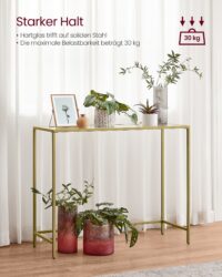 Glastisch in Gold-Transparent für stilvolle Wohnräume.