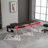 Klappbare Massageliege, höhenverstellbar und aus Aluminium. Ideal für Physiotherapie und Wellness zu Hause oder unterwegs.