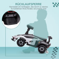 Weiss-schwarzes Rutschauto als Kinderfahrzeug mit Hupe, perfekt für den Einsatz drinnen und draussen.