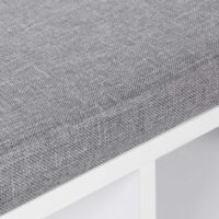 Weiße Schuhbank mit zehn Fächern, stilvolle und funktionale Aufbewahrung.