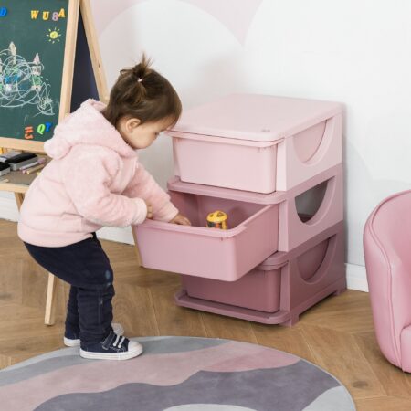 Rosa Kinderkommode mit drei Fächern und Stoffboxen, perfekt zur Spielzeugaufbewahrung und Organisation im Mädchenzimmer. Schafft schnell Ordnung und ist leicht zugänglich für kleine Kinder.