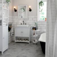 Waschbeckenunterschrank im Landhausstil mit 60x30x60 cm in Weiß.